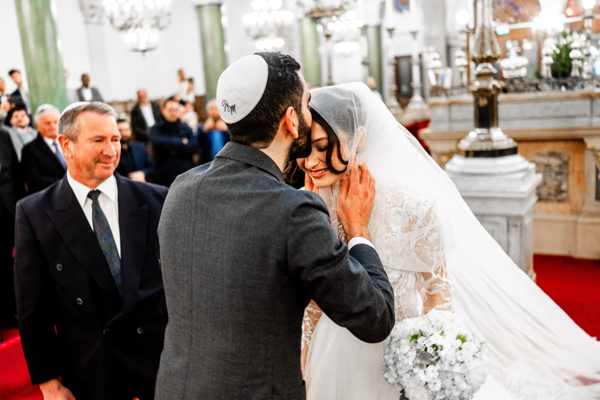Le baiser sur le front